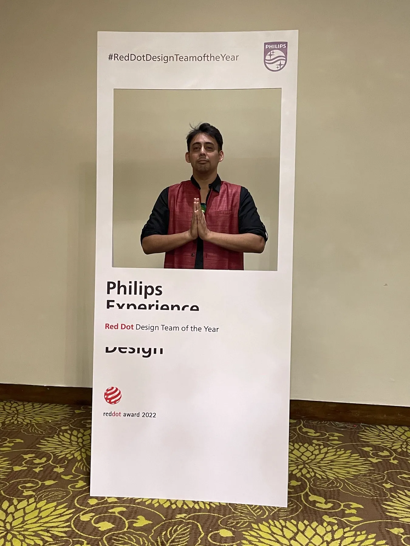 Shubham Gupta inside a Philips Experience Design Red Dot Team of the Year frame.