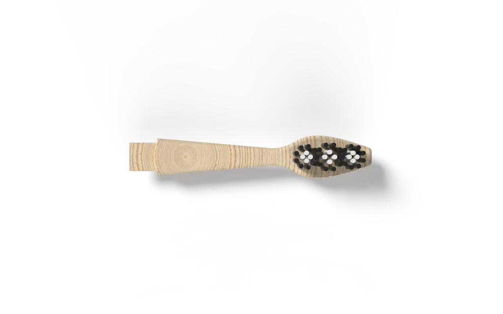 Rendered wood-grain detachable brush head with a compact mixed-colour bristle cluster.
