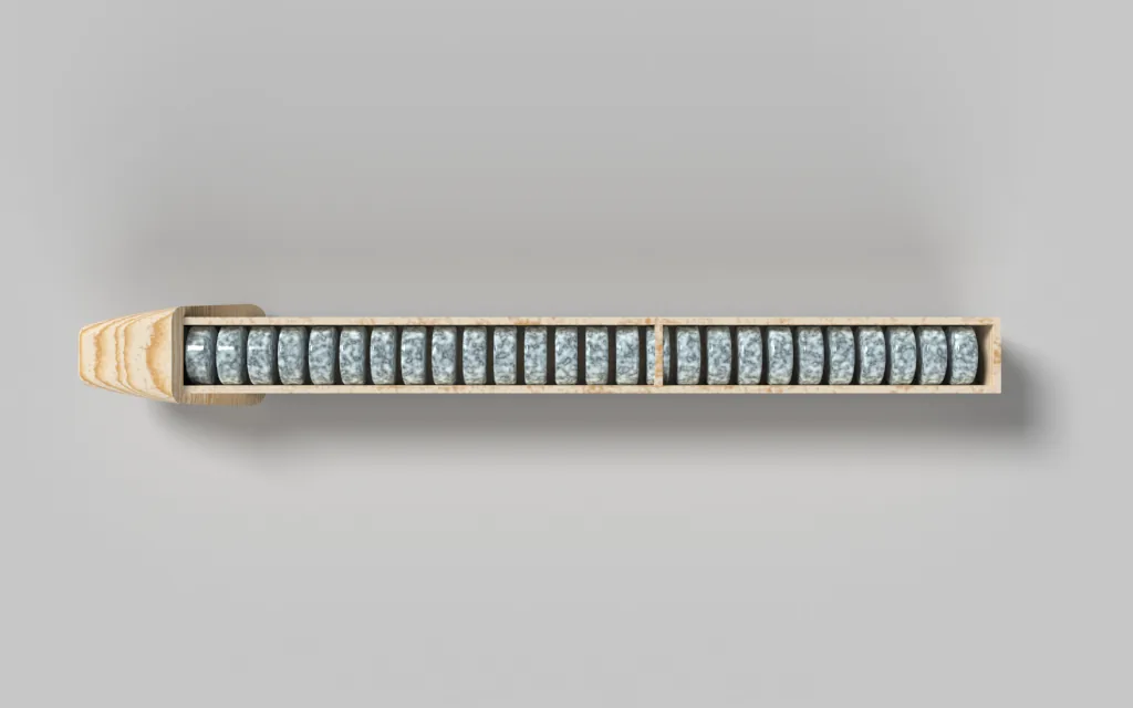 Top-view render of a long toothbrush-handle channel filled with pellet models.