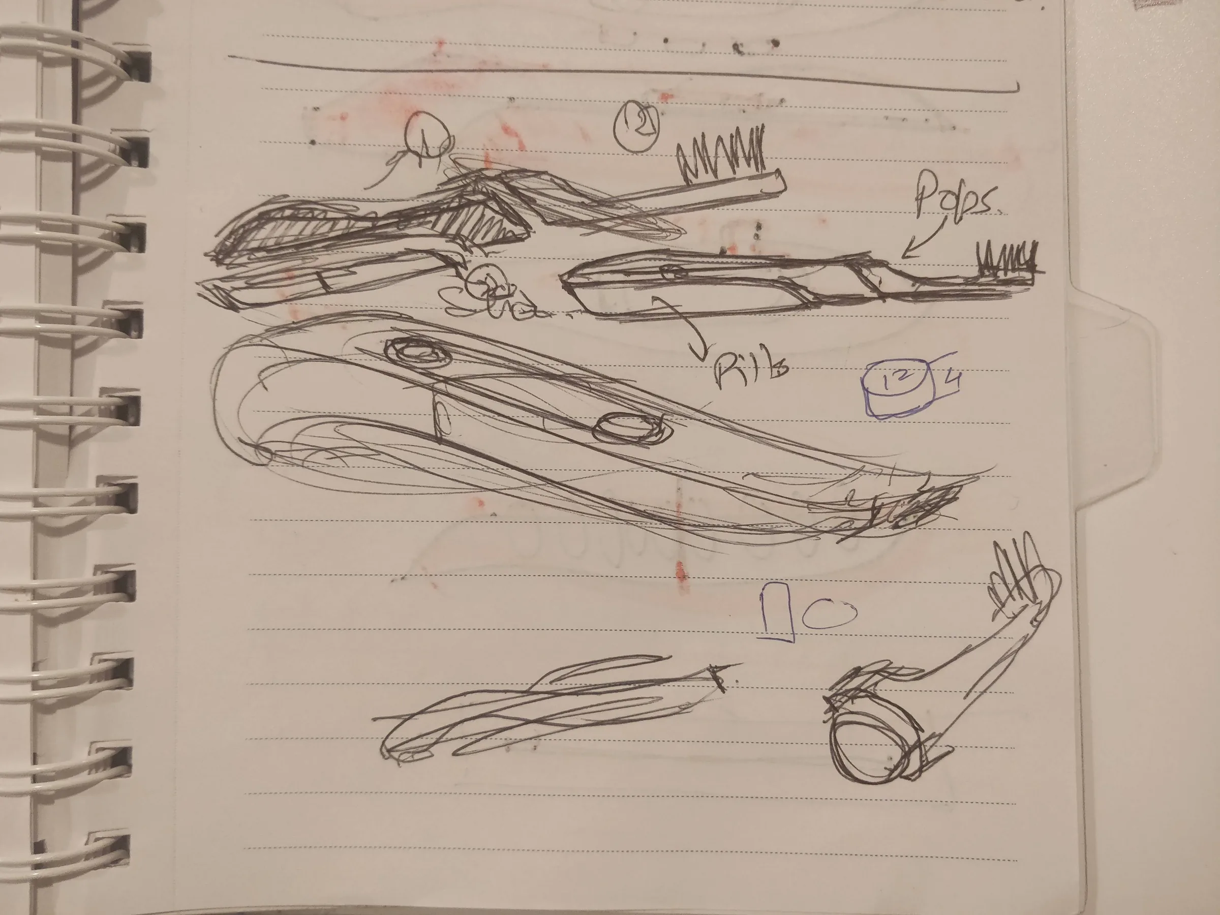 Sketchbook page with several toothbrush-handle and control-form studies.
